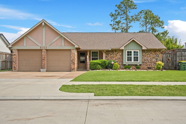 5111 Halbert Dr, Pearland, TX 77581 - view of front of property with a garage, concrete driveway, brick siding, and roof with shingles