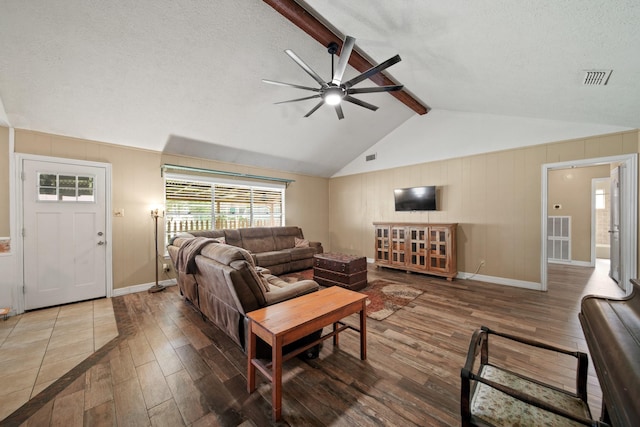 5111 Halbert Dr, Pearland, TX 77581 - living room with wood finished floors, ceiling fan, baseboards, and a textured ceiling