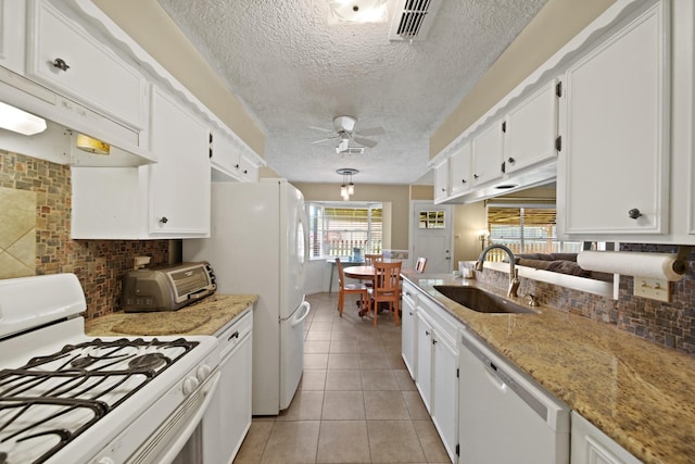 5111 Halbert Dr, Pearland, TX 77581 - kitchen featuring a sink, white appliances, a ceiling fan, white cabinets, and a textured ceiling