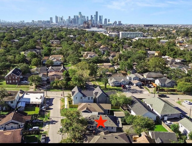 4915 Walker St, Houston, TX 77023 - aerial view of residential area with city skyline