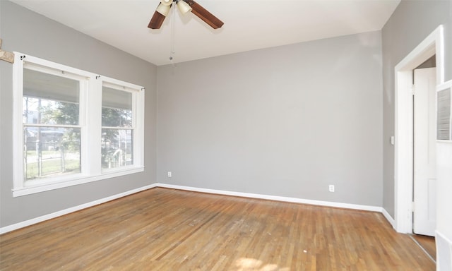 4915 Walker St, Houston, TX 77023 - unfurnished room featuring light wood-style floors, baseboards, and ceiling fan