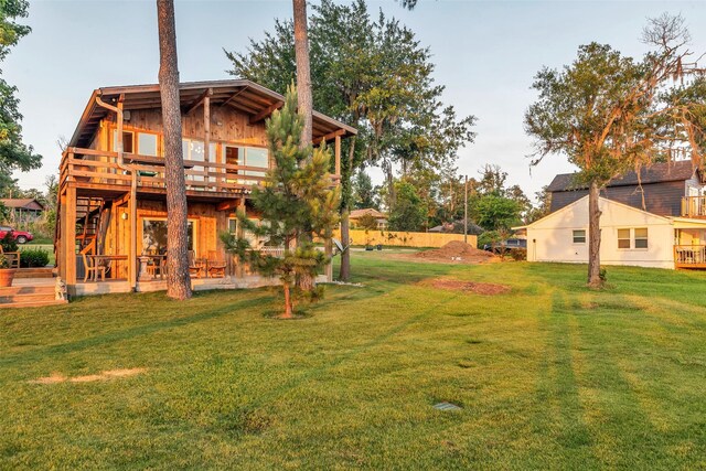 784 W Cattle Dr, Onalaska, TX 77360 - view of green lawn featuring a deck