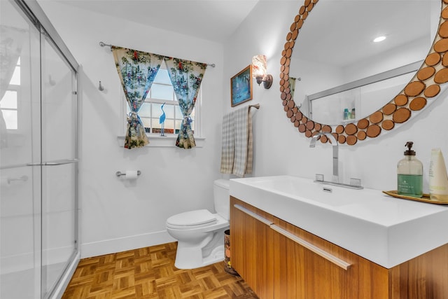 784 W Cattle Dr, Onalaska, TX 77360 - full bathroom featuring vanity, toilet, a shower stall, and baseboards
