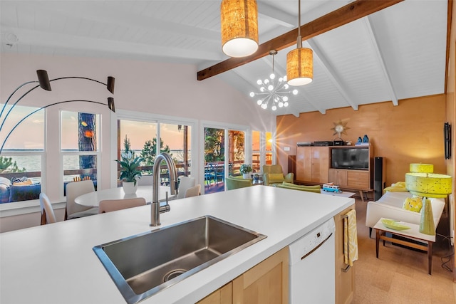 784 W Cattle Dr, Onalaska, TX 77360 - kitchen with a sink, open floor plan, white dishwasher, light brown cabinets, and a chandelier