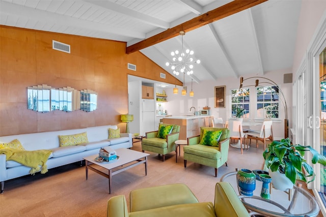 784 W Cattle Dr, Onalaska, TX 77360 - living room featuring a chandelier and light carpet