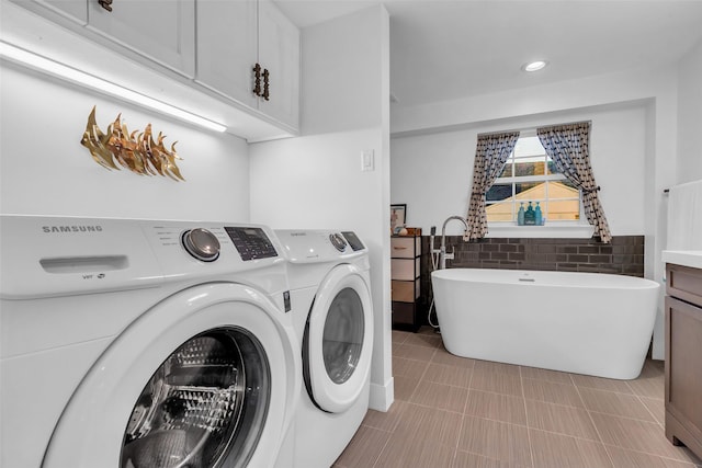 784 W Cattle Dr, Onalaska, TX 77360 - laundry area featuring washer and clothes dryer, a wainscoted wall, recessed lighting, and tile walls