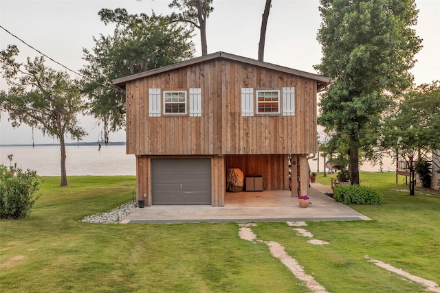 784 W Cattle Dr, Onalaska, TX 77360 - view of outbuilding with a water view