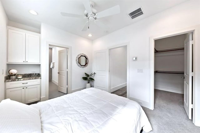 1822 Mcilhenny St Unit B, Houston, TX 77004 - bedroom with a spacious closet, carpet flooring, recessed lighting, baseboards, and ceiling fan