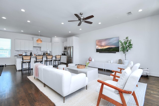 1822 Mcilhenny St Unit B, Houston, TX 77004 - living room featuring a ceiling fan, wood finished floors, and recessed lighting