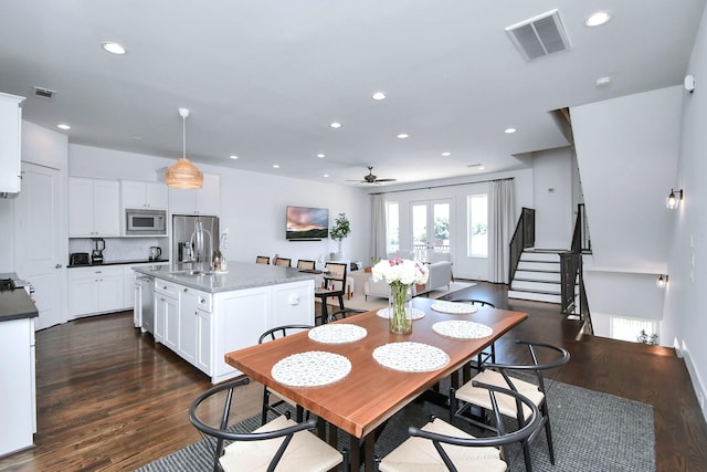 1822 Mcilhenny St Unit B, Houston, TX 77004 - dining space with a ceiling fan, dark wood finished floors, recessed lighting, and stairs