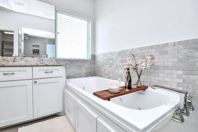 1822 Mcilhenny St Unit B, Houston, TX 77004 - bathroom with vanity and a whirlpool tub