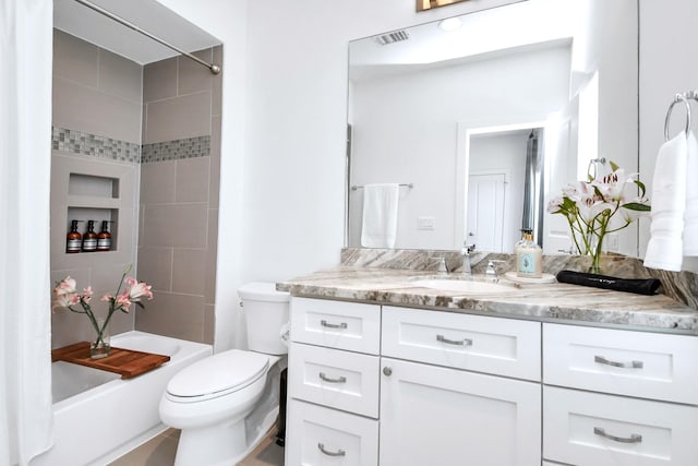 1822 Mcilhenny St Unit B, Houston, TX 77004 - bathroom featuring vanity, shower / tub combination, and toilet