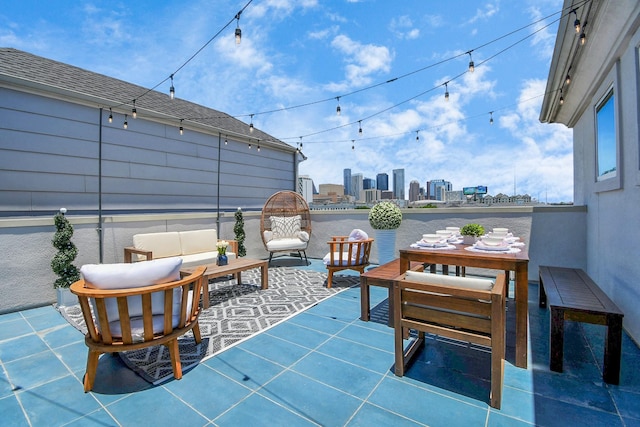 1822 Mcilhenny St Unit B, Houston, TX 77004 - view of patio featuring a skyline view and an outdoor living space