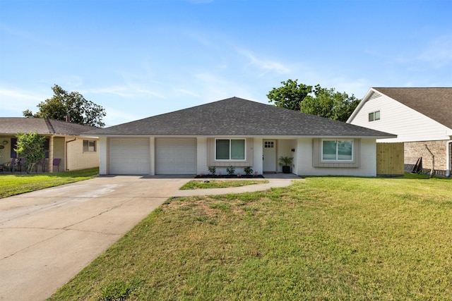 2801 Pickerton Dr, Deer Park, TX 77536 - ranch-style home with an attached garage, concrete driveway, a front lawn, and a shingled roof