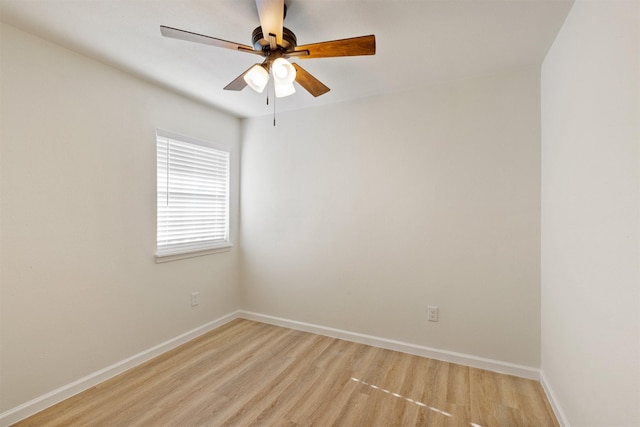 2801 Pickerton Dr, Deer Park, TX 77536 - unfurnished room with light wood finished floors, a ceiling fan, and baseboards
