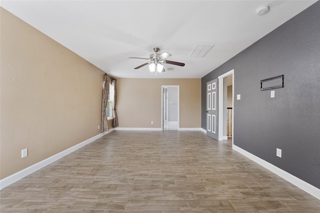 16503 Timberidge Ct, Cypress, TX 77429 - unfurnished room with a ceiling fan, light wood-style flooring, a smoke detector, and baseboards