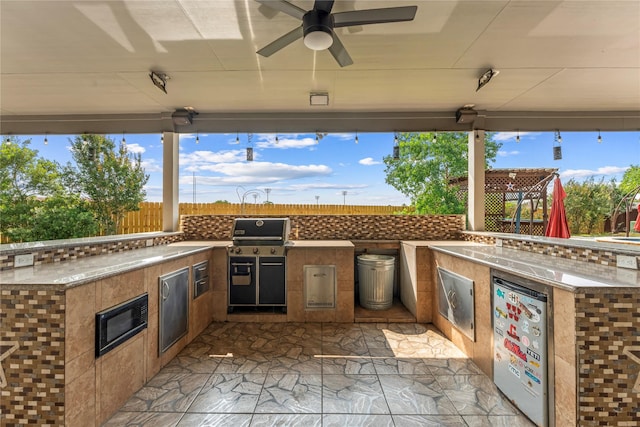 16503 Timberidge Ct, Cypress, TX 77429 - view of patio / terrace featuring a ceiling fan and a sink