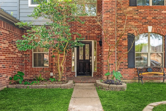 16503 Timberidge Ct, Cypress, TX 77429 - doorway to property featuring brick siding and a lawn