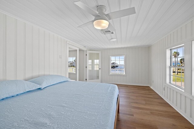 3903 2nd St, Galveston, TX 77554 - bedroom featuring wood finished floors, wood ceiling, crown molding, and ceiling fan