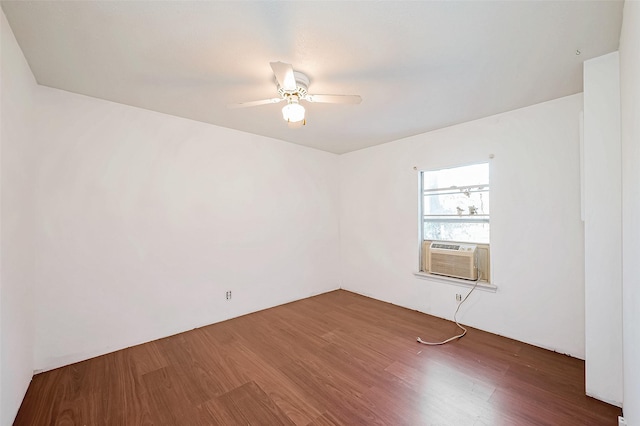 31002 Misty Meadow Dr, Magnolia, TX 77354 - empty room with cooling unit, wood finished floors, and ceiling fan