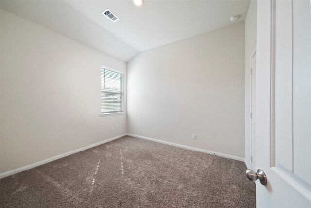 6502 Blimp Base Blvd, Hitchcock, TX 77563 - carpeted empty room with vaulted ceiling, baseboards, and a smoke detector