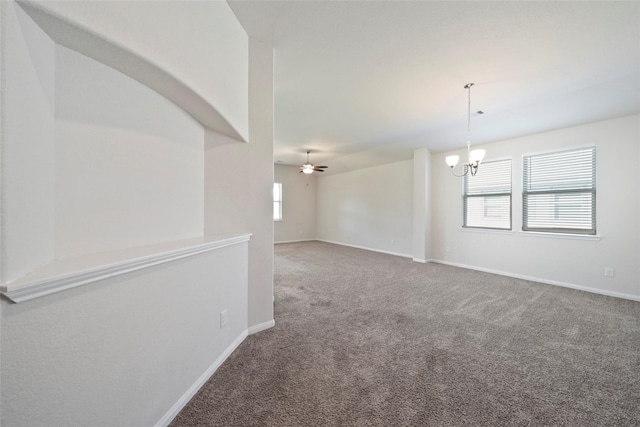 6502 Blimp Base Blvd, Hitchcock, TX 77563 - empty room with carpet, a chandelier, ceiling fan, and baseboards