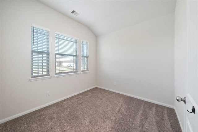 6502 Blimp Base Blvd, Hitchcock, TX 77563 - unfurnished room featuring carpet, vaulted ceiling, and baseboards