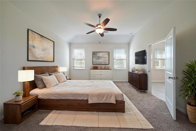 6502 Blimp Base Blvd, Hitchcock, TX 77563 - carpeted bedroom featuring vaulted ceiling, baseboards, and a ceiling fan