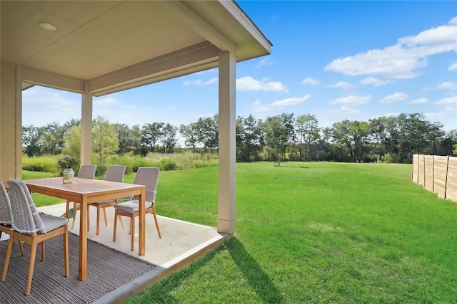 6502 Blimp Base Blvd, Hitchcock, TX 77563 - view of grassy yard featuring outdoor dining area and a patio area
