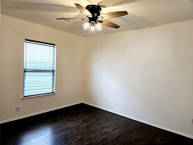 8039 Ellinger Ln, Houston, TX 77040 - empty room featuring ceiling fan, dark wood finished floors, and baseboards