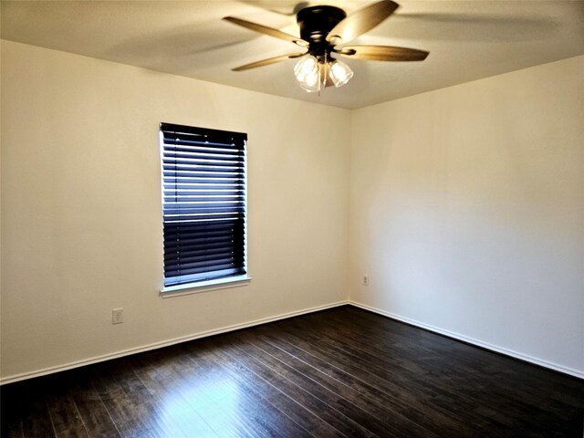 8039 Ellinger Ln, Houston, TX 77040 - unfurnished room featuring a ceiling fan, dark wood-style floors, and baseboards