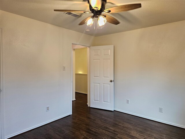 8039 Ellinger Ln, Houston, TX 77040 - unfurnished room with ceiling fan, dark wood-style flooring, and baseboards