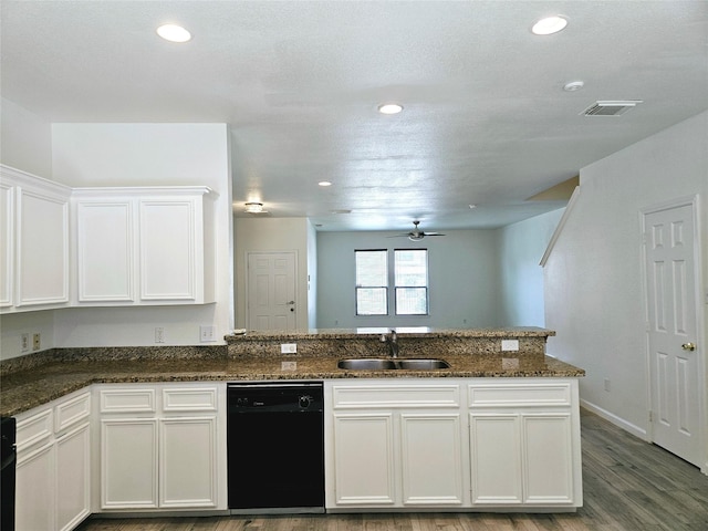 8039 Ellinger Ln, Houston, TX 77040 - kitchen with dishwasher, a sink, wood finished floors, ceiling fan, and dark stone countertops