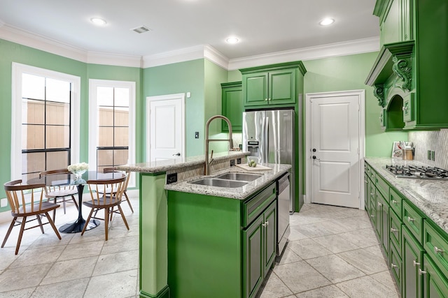 2306 Mcduffie St, Houston, TX 77019 - kitchen featuring green cabinets, a sink, stainless steel appliances, ornamental molding, and recessed lighting