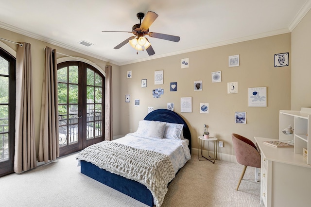 2306 Mcduffie St, Houston, TX 77019 - bedroom with light carpet, access to exterior, crown molding, french doors, and a ceiling fan