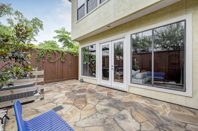 2306 Mcduffie St, Houston, TX 77019 - view of patio featuring french doors