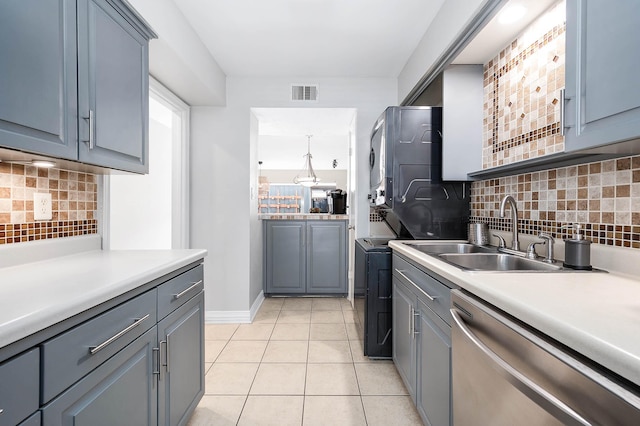 2011 Winrock Blvd Unit 172, Houston, TX 77057 - kitchen with dishwasher, a sink, decorative backsplash, and light tile patterned floors