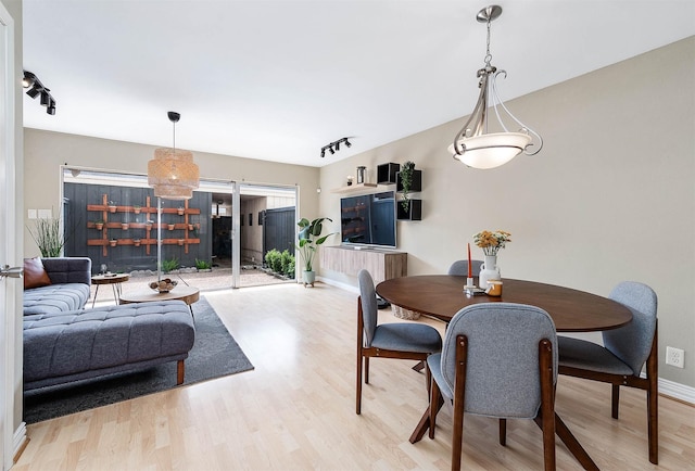 2011 Winrock Blvd Unit 172, Houston, TX 77057 - dining area featuring wood finished floors and baseboards