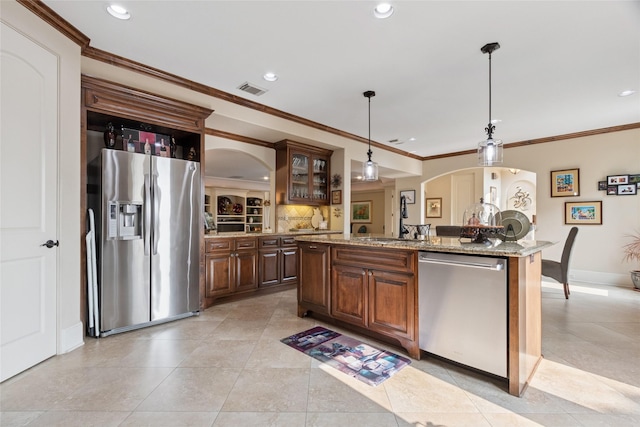 5520 Mcculloch Cir, Houston, TX 77056 - kitchen featuring stainless steel appliances, crown molding, light tile patterned floors, light stone counters, and recessed lighting