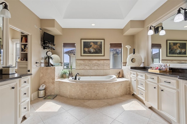 5520 Mcculloch Cir, Houston, TX 77056 - full bathroom featuring vanity, a bath, and tile patterned flooring