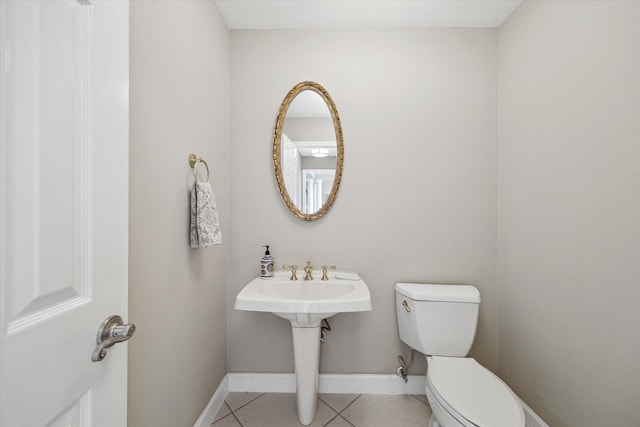 42 Stalybridge St, Sugar Land, TX 77479 - bathroom featuring toilet, baseboards, and tile patterned flooring