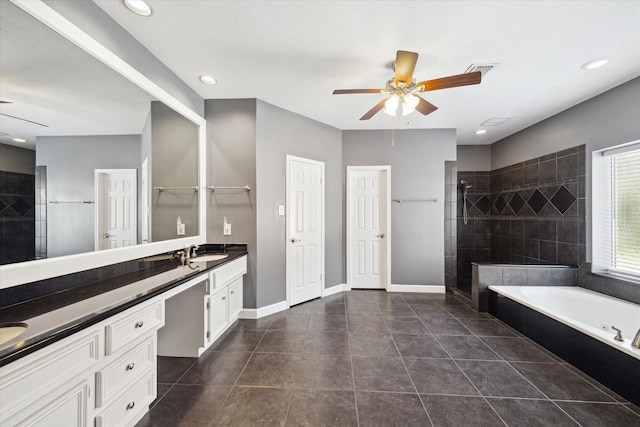 42 Stalybridge St, Sugar Land, TX 77479 - full bathroom with vanity, ceiling fan, a bath, a tile shower, and tile patterned flooring