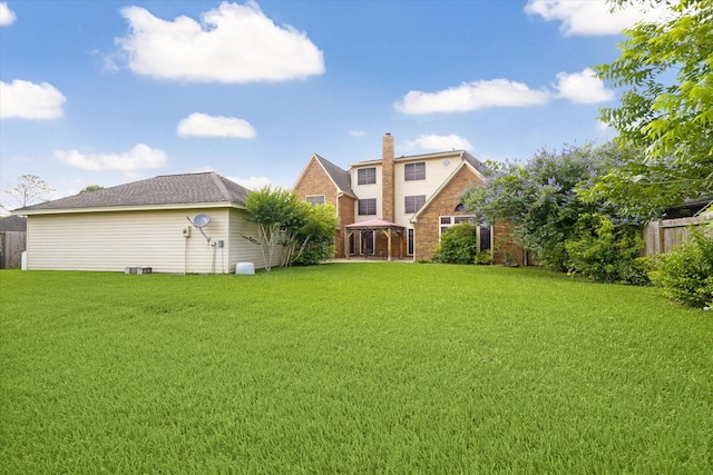 42 Stalybridge St, Sugar Land, TX 77479 - rear view of property featuring a gazebo and a chimney
