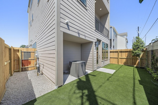 1720 Sedola Ln, Houston, TX 77055 - view of yard featuring central AC unit, a patio, and a gate