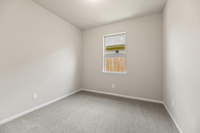 18810 Lucas Michael Way, New Caney, TX 77357 - carpeted empty room featuring baseboards