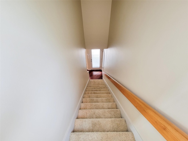 4900 Willow St, Bellaire, TX 77401 - stairs featuring baseboards