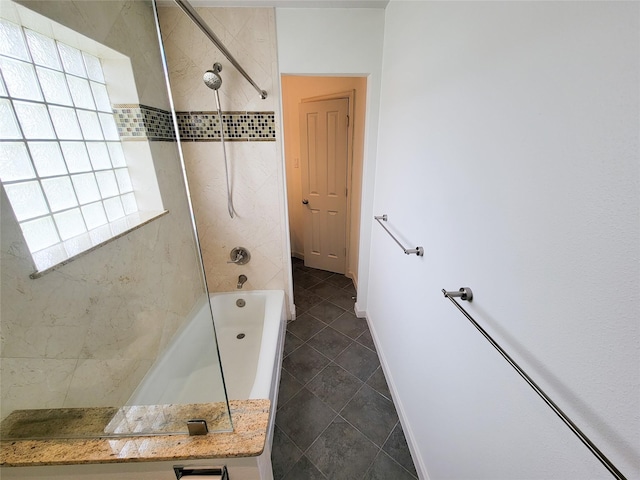 4900 Willow St, Bellaire, TX 77401 - full bath with tub / shower combination and tile patterned flooring