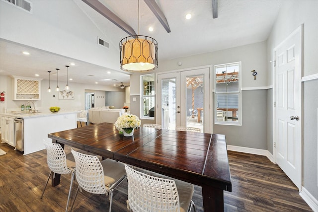 11102 Hillcroft St, Houston, TX 77096 - dining area featuring dark wood-style floors, baseboards, recessed lighting, and french doors