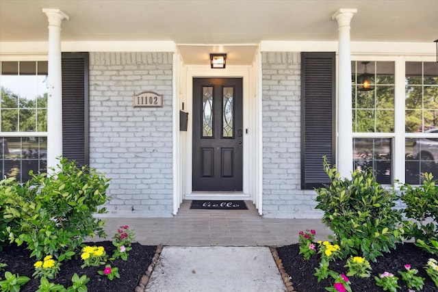 11102 Hillcroft St, Houston, TX 77096 - entrance to property featuring brick siding and a porch