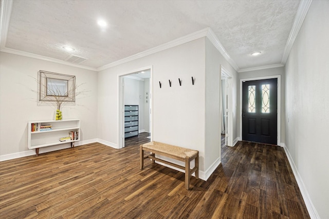 11102 Hillcroft St, Houston, TX 77096 - entryway featuring wood finished floors, baseboards, a textured ceiling, recessed lighting, and ornamental molding